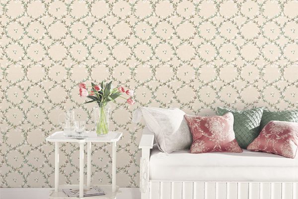 Living room with green, teal and taupe leaf wreath wallpaper